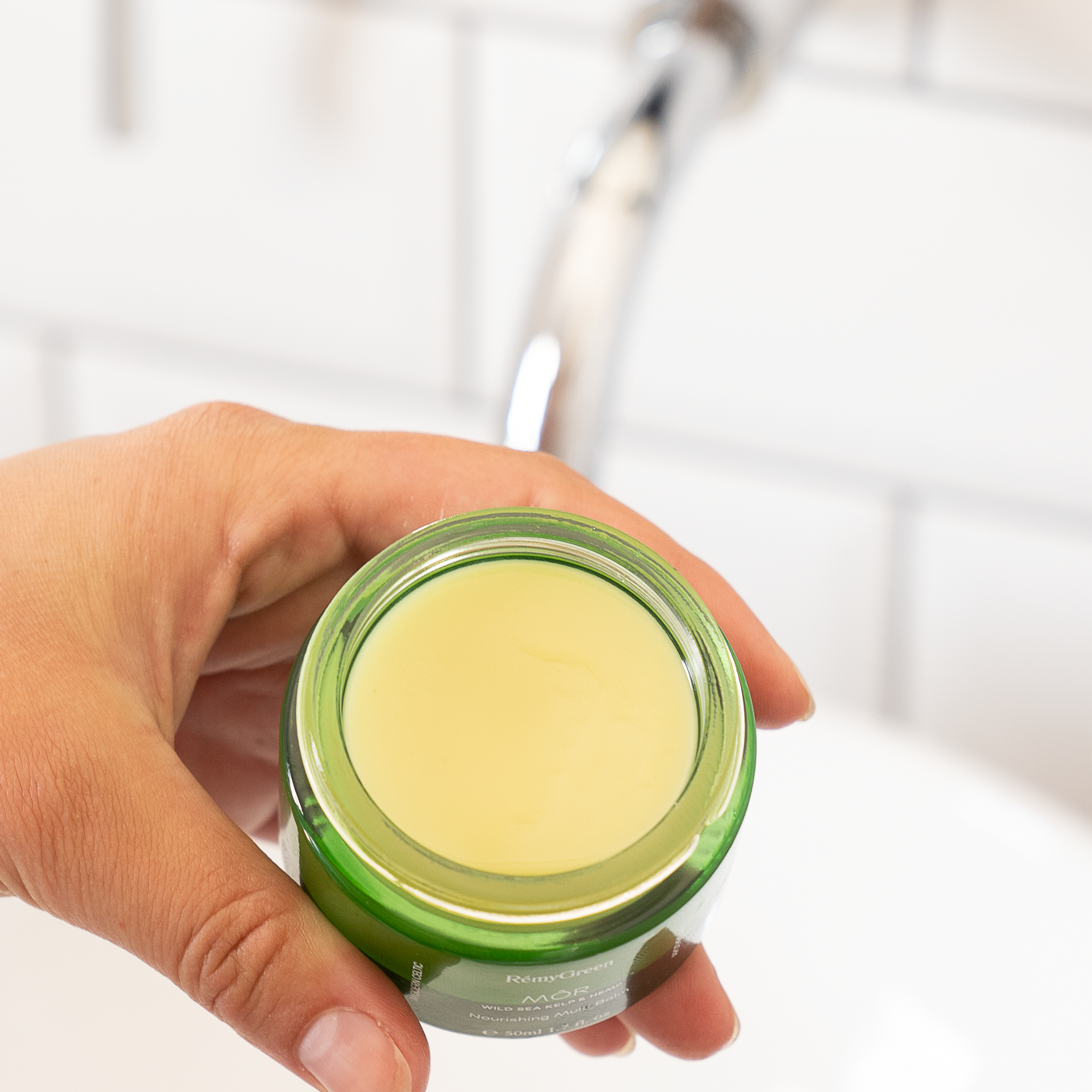 Open jar of MÔR nourishing multi balm with sea kelp and shea butter 